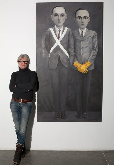 Photo of Dutch contemporary painter Ellen de Meijer, 2014, posing next to her painting 'Civil War'